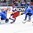 SOCHI, RUSSIA - APRIL 28: Russia's Vladimir Tkachyov #21 scored 1-2 goal on Finland's Juuse Saros #31 during bronze medal action at the 2013 IIHF Ice Hockey U18 World Championship. (Photo by Matthew Murnaghan/HHOF-IIHF Images)